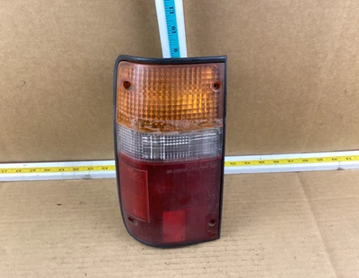 Conjunto de luz trasera izquierda del lado del conductor para camioneta Toyota 1989-1995 OEM Foto 1 de 4