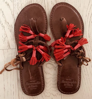 NUEVO Sandalia Tanga Plana Sin Etiqueta Abercrombie & Fitch Cuero Trenzado Marrón Oscuro M/L Foto 1 de 4