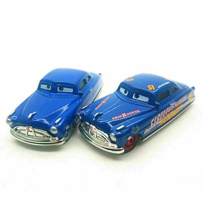 2 PIEZAS Coches Disney Pixar Doc Hudson y Fabuloso Doc Hudson Modelo Diecast Coche de Juguete Foto 1 de 3