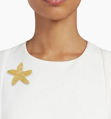 Broche prendedor estrella de mar tono dorado Swarovski con cristales transparentes dispersos retirado raro Foto 1 de 4