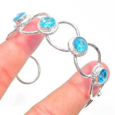 Brazalete brazalete suizo de plata de ley 925 con piedras preciosas de topacio azul hecho a mano Foto 1 de 4