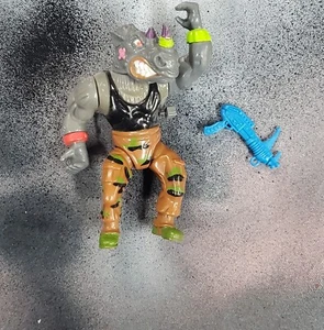 Machine Gunnin Rocksteady Wind Up Playmates 1991 Vintage TMNT Wacky Action #357 - Bild 1 von 2