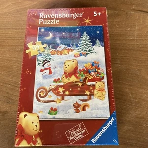 Ravensbuger WeihnachtsPuzzle 99 Teile - Lindt Teddy auf Schlitten - Neu - Bild 1 von 1