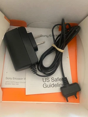 Настенное зарядное устройство Sony Ericsson W51a от оригинального производителя с быстрым портом подлинное оригинальное - Изображение 1 из 2