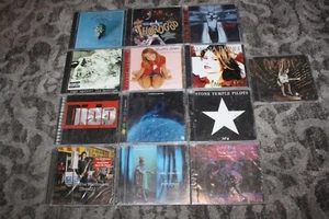 Lot 13 Used ASSORTED Music CDs METAL POP ROCK AC/DC OZZY EAGLES BRITNEY NEW/USED - Picture 1 of 4
