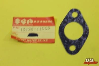 Junta de carburador Suzuki 1969-1984 T20 TC185 TS185 13125-11000 NUEVO OEM Foto 1 de 3