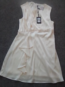 Vestido para mujer DKNY asimétrico plisado con corpiño crema mantequilla talla 12P nuevo con etiquetas - Imagen 1 de 7