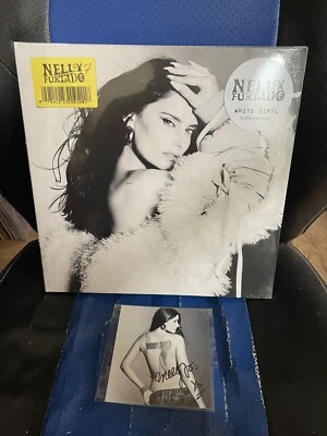 LIMITED EDITION NELLY FURTADO 7 EXCLUSIVE WHITE VINYL WITH HAND SIGNED ART CARD - Imagem 1 de 4