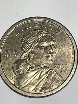 RARA MONEDA DE UN DÓLAR SACAGAWEA 2000 P ESCRITURA SIN BORDES ORO LIBERTAD EE. UU. Foto 1 de 4