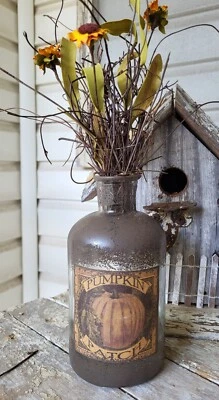 Pumpkin Patch Bottle with Faux Flowers and Angel Hair - Image 1 of 4