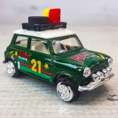 Mini Cooper Rallye Mini Clubs Spot 21 Green w Rooftop Cargo 1:64 (tire cracked) - Image 1 of 4