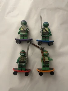 LEGO TMNT Teenage Mutant Ninja Turtle Lair Lot 4 Set Minifigure Skateboard Sword - Picture 1 of 6