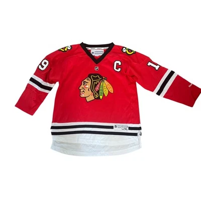 Camiseta deportiva de hockey juvenil Reebok NHL Chicago Blackhawks Jonathan Toews 19 L/XL Foto 1 de 3