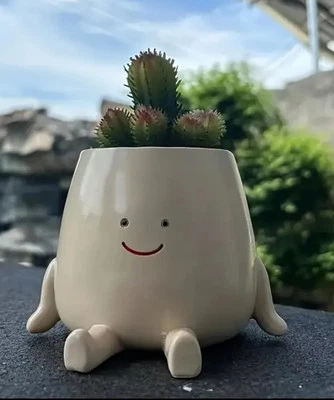 Maceta redonda de resina Smile Face Head - de JAX, FL EE. UU. (sin planta) Foto 1 de 4