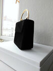Schwarze Abendtasche mit poliertem Messinghenkel „Elegance“