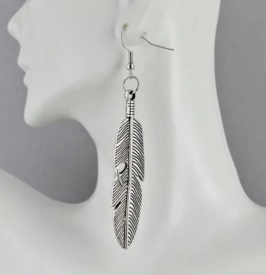 Silver feather earrings dangle metal feather textured 3.25" long - Image 1 of 4