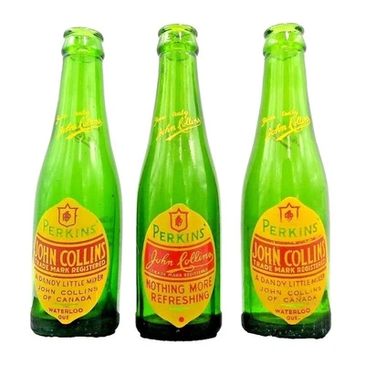 Botella mezcladora de refrescos vintage Perkins John Collins Waterloo Ontario verde ACL Canadá Foto 1 de 4