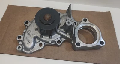 Carcasa de bomba de agua Toyota Camry Lexus 2.5 3.0L OEM NOS 1988-1993 TOYOTA AISIN Foto 1 de 4