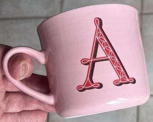 "A" BECHER VON OPAL HOUSE STONEWEARE ROSA MIT SCHWARZ-WEISSEM A & GOLDRAND - Bild 1 von 11