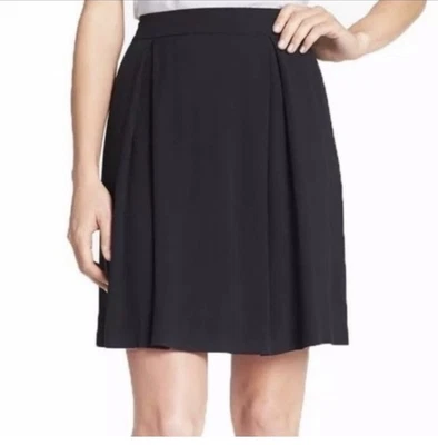 Falda Eileen Fisher 100 % seda negra hasta la rodilla usada en excelente estado grande Foto 1 de 4