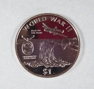 1997 REPUBLIC OF LIBERIA - RAID ON THE DAMS, BRITISH FLYING MEDAL - $1 COIN UNC. - Picture 1 of 2