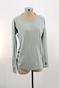 Top Lululemon Talla 12 Verde Swiftly Tech Manga Larga Agujeros para el Pulgar Sweat Life - Imagen 1 de 4