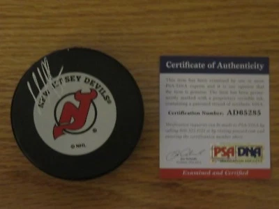 Goalie MARTIN BRODEUR signed NEW JERSEY DEVILS Stanley Cup Champions Puck PSA - Image 1 of 2