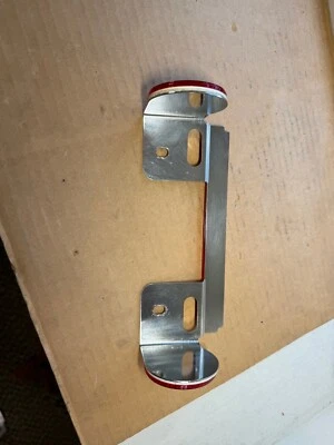 Conjunto de reflector de matrícula cromado Victory Kingpin OEM 2632828 Foto 1 de 4