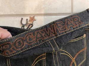ROCKWEAR~STITCHES EMBROIDERY~LOGO+CHARMS SEXY LOW RISE HIPPIE FLARE-JEANS 1/2NWT - Picture 1 of 12