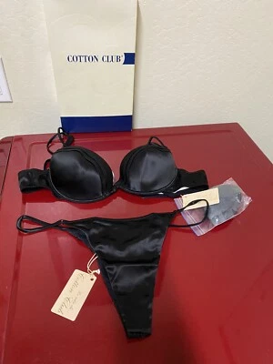 JUEGO DE 2 SUJETADORES Y TANGA CLUB ALGODÓN NEGRO Y FLORAL MARFIL/MELOCOTÓN.  Foto 1 de 4