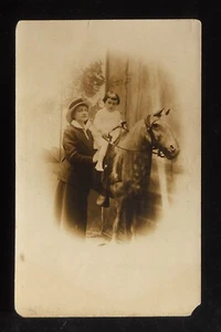 RPPC 1900s? Cute Little Girl on a Stuffed Horse Woman in Hat - Imagen 1 de 2