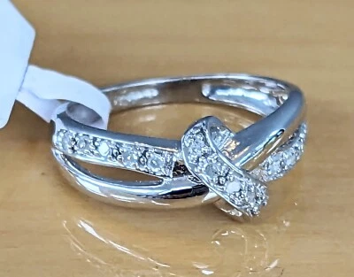 9CT WHITE GOLD 0.10CT TW DIAMOND BOW FANCY RING Size N. RRP £300 - Image 1 of 4