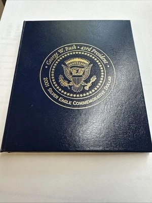 George W. Bush Colorized 2001 Silver Eagle Commemorative Dollar In Sleeve & COA  - Image 1 of 4