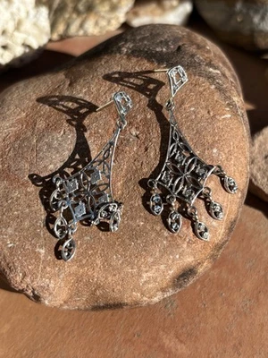 Pendientes de diamantes de plata Foto 1 de 4