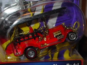Camión de hierro de bomberos TOY ZONE TOM DANIEL HOT ROD MÚSCULO COLECCIONABLE 1:43 - Rojo, en paquete - Imagen 1 de 3