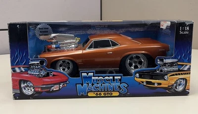 NIB Muscle Machines 1966 Pontiac GTO Diecast Orange Model Car 1/18 Scale  - Image 1 of 4