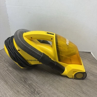 Aspiradora de mano Eureka EasyClean 120V amarilla con cable Modelo: 71 Foto 1 de 4