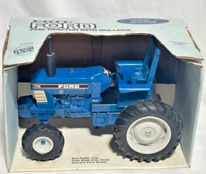 ERTL FORD 7710 w/ ROP FWA Blue Farm Tractor, 1/16 - Picture 1 of 5