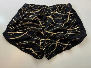 Nike  Girls Dri-FIT Tempo Shorts in Black/Gold - Picture 1 of 6