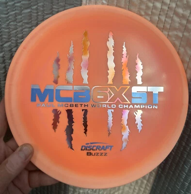 NEW Discraft McBeth 6X Claw McBeast ESP Buzzz 170-2g Orange Halo Blendy Am Flag - Image 1 of 4