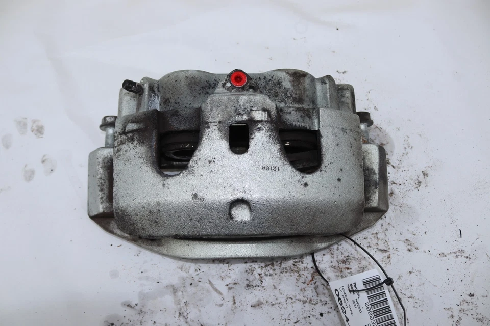 Pinza de freno delantera izquierda del lado del conductor Nissan NV1500 NV2500 NV3500 2012-2021 OEM Foto 1 de 4