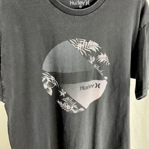 Vintage Hurley schwarzes T-Shirt Spell Out Logo Größe Large verblasst - Bild 1 von 9