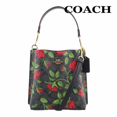 Bolsa Coach Mollie Bucket 22 em lona com estampa rosa e conto de fadas - Imagem 1 de 4