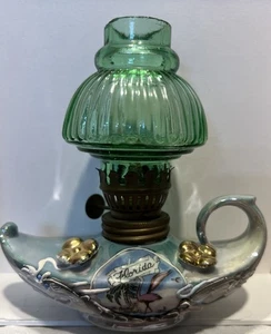 Vintage small genie lamp green that says Florida. - Picture 1 of 3