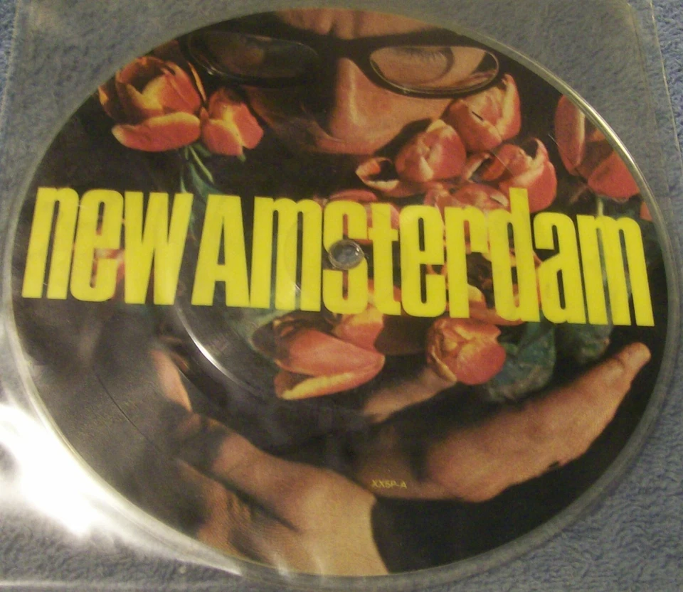 ELVIS COSTELLO - NEW AMSTERDAM - F - BEAT - UK - 7" - PD (NM) NEVER PLAYED - Image 1 of 1