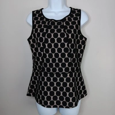 Top Weston Wear para mujer mediano peplum nailon negro lunares estructura caprichosa Foto 1 de 4