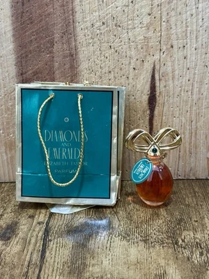 Mini perfume Diamantes y esmeraldas de Elizabeth Taylor .12 fl. oz bolsa de regalo Foto 1 de 2