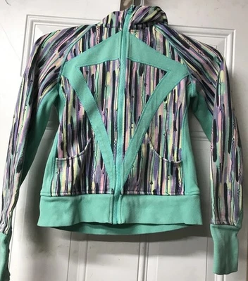 Ivivva LuluLemon Niñas Buceo Talla 14 Cremallera Completa Sudadera con Capucha Verde Púrpura Rayas Foto 1 de 4