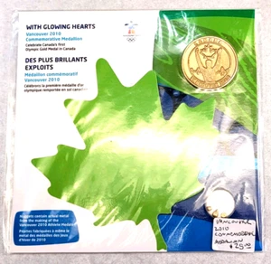 2010 Canada Vancouver Olympics "With Glowing Hearts" Medallion &Nuggets RCM Seal - Picture 1 of 2