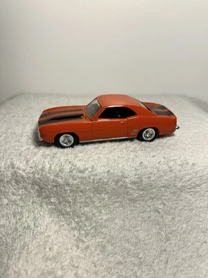 Chevrolet Camaro Z/28 1969 ERTL naranja con rayas negras fundido a presión 1:43 Foto 1 de 4